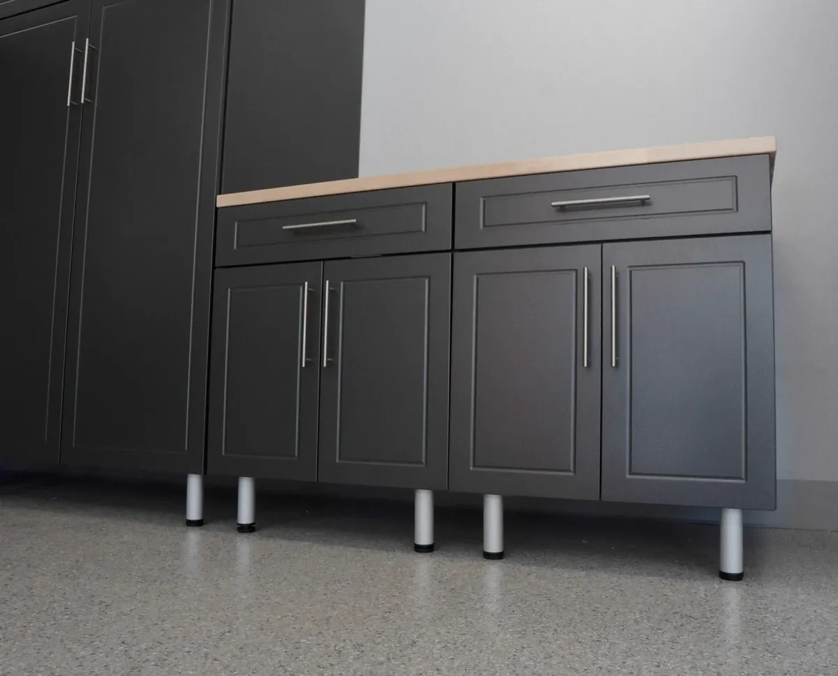 Powder coating application process on MDF cabinet surfaces at Strux Garage of Idaho facility